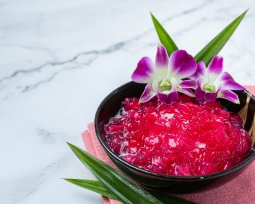 Simulated pomegranate in coconut syrup, cassava, Thai dessert.